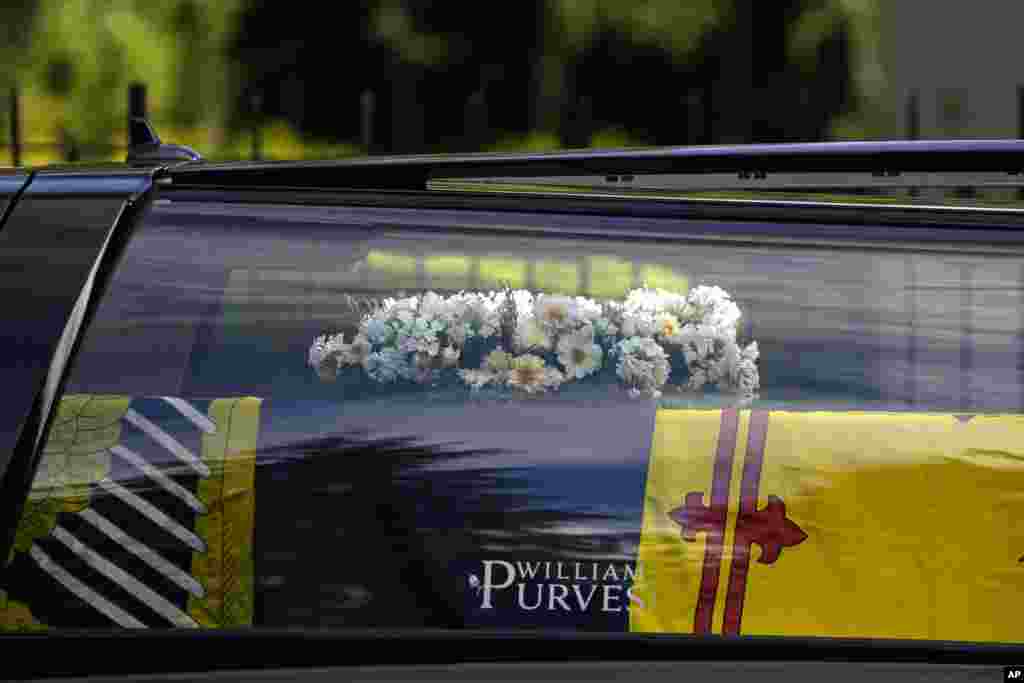 The coffin containing the body of Britain's Queen Elizabeth II leaves Balmoral Castle in Scotland, Sept. 11, 2022.