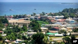 FILE - Ships are docked offshore in Honiara, capital of the Solomon Islands, Nov. 24, 2018. Lawmakers in the Solomon Islands voted Sept. 8, 2022, to delay their nation's general election from next year until 2024.