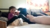 Detained Migrant Minors in US Get More Phone Time With Family