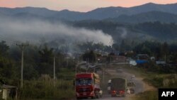 တရုတ်ပြည်နဲ့နယ်စပ် ရှမ်းပြည်နယ်အတွင်းက မူဆယ်မြို့အနီး ကားလမ်းတခုကိုတွေ့ရစဉ် (ဇန်နဝါရီ ၁၂၊ ၂၀၁၉)