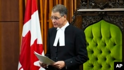 FILE — Anthony Rota speaks in Canada's House of Commons in Ottawa, Ontario, Sept. 22, 2023. Days later, he resigned as Speaker of the House of Commons for praising in Parliament a man who served in a Nazi SS unit during World War II. (Sean Kilpatrick/The Canadian Press via AP)