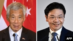 资料照：新加坡总理李显龙（左），新加坡副总理兼财政部长黄循财