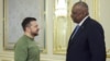 Ukrainian President Volodymyr Zelenskyy, left, and U.S. Secretary of Defense Lloyd Austin talk during their meeting in Kyiv, Ukraine, Nov. 20, 2023. (Ukrainian Presidential Press Office via AP)