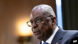 FILE - U.S. Defense Secretary Lloyd Austin testifies on Capitol Hill in Washington, Oct. 31, 2023. During a speech on Saturday, he said that sustained U.S. leadership is needed to help keep the world as safe, free and prosperous as possible.