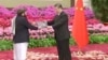 The Taliban's ambassador to China, Asadullah Bilal Karimi, left, is seen presenting his credentials to Chinese President Xi Jinping, in a photo posted on X Jan. 30, 2024, by Abdul Qahar Balkhi, spokesperson of the Taliban's foreign ministry.