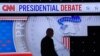 U.S. President Joe Biden walks during a break as he participates in a presidential debate in Atlanta, Georgia, June 27, 2024.