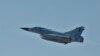 Sebuah jet tempur Dassault Mirage 2000-5 Angkatan Udara Emiri Qatar lepas landas sebagai bagian dari misi Joint Task Force Odyssey Dawn (JTF-OD) di Teluk Souda di Yunani, 25 Maret 2011. (REUTERS/Paul Farley/A.S. Navy Photo/Handout)