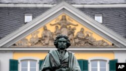 A statue of world famous composer Ludwig van Beethoven is stands in the city center of his birthplace Bonn, Germany, on Tuesday, March 21, 2023. (AP Photo/Martin Meissner)