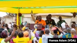 Shugabanin kasar Ghana Nana Akufo-Addo a wani taro da manoman Cocoa