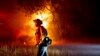 California firefighters gain ground against big wildfires after hot, windy weekend 