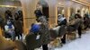 FILE- Beauticians put makeup on customers at Ms. Sadat's Beauty Salon in Kabul, Afghanistan, April 25, 2021. A spokesman at Afghanistan's Vice and Virtue Ministry said July 4, 2023, the Taliban are banning women's beauty salons. 