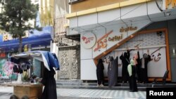 Afghan beauticians close their beauty salon in Kabul, Afghanistan, July 24, 2023. 