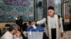 Iran touts democratic bona fides amid restricted presidential poll 