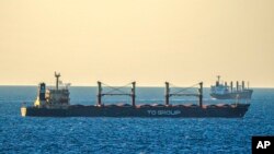 FILE - A bulk grain cargo ship is anchored in the Black Sea near the entrance of the Bosphorus Strait in Istanbul, Turkey, July 17, 2023.