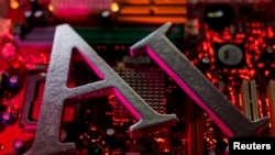 FILE - The letters AI (for Artificial Intelligence) and a robot's hand are seen against the backdrop of an illuminated computer motherboard in this illustration photo taken June 23, 2023.