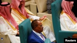 Sudan's ambassador to Egypt Abdelaziz Hassan Saleh looks on next to Saudi Arabia's delegations during a meeting of Arab foreign ministers at the Arab League Headquarters, to discuss the Syrian situation and Sudan crisis, in Cairo, May 7, 2023. 