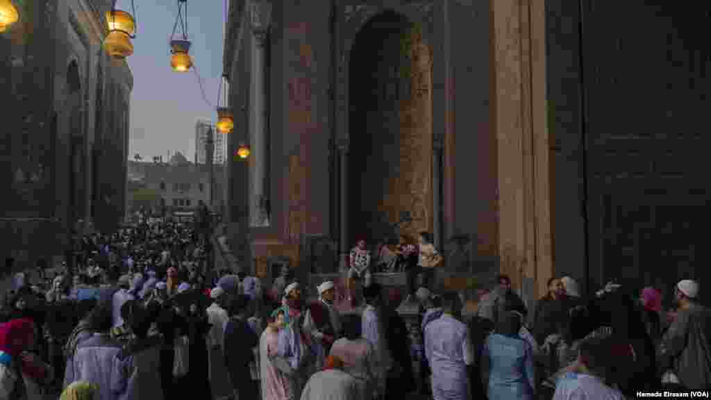 Thousands of worshippers gather around Old Cairo’s Mosque of Sultan Hassan for the end of the fasting month of Ramadan and the start of Eid al-Fitr, which is determined by official sightings of the new moon and one’s geographic location.