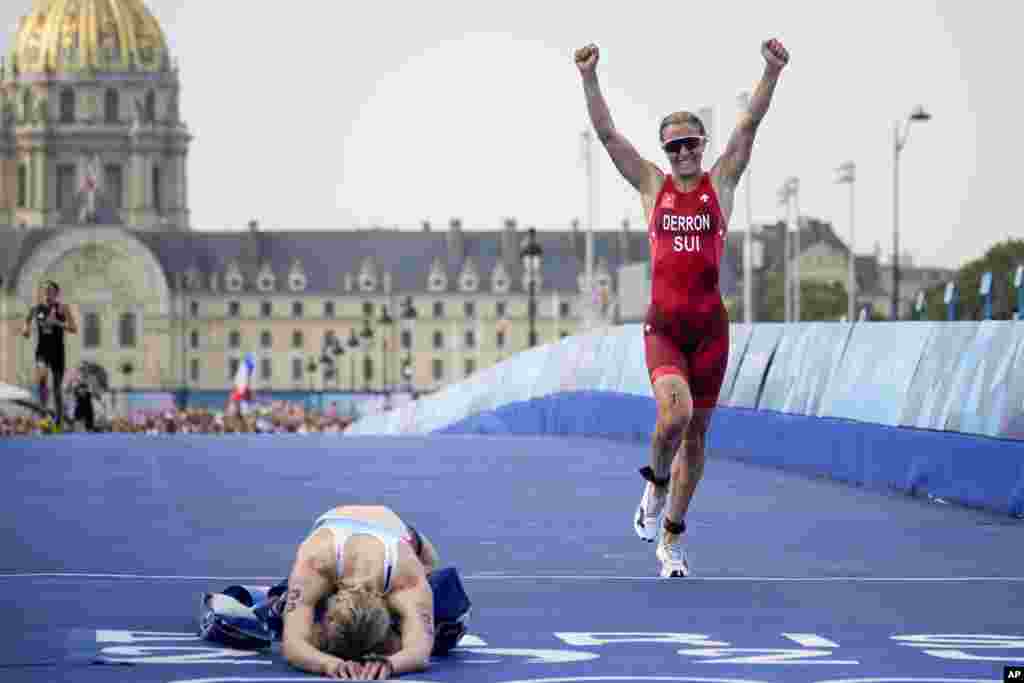 Julie Derron of Switzerland celebrates winning the silver medal at the end of the women's individual triathlon competition at the 2024 Summer Olympics, in Paris, France.
