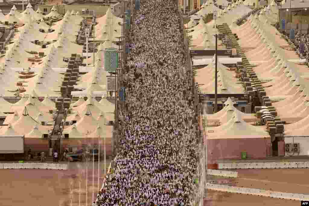 Muslim pilgrims arrive to perform the symbolic 'stoning of the devil' ritual as part of the hajj pilgrimage in Mina, near Saudi Arabia's holy city of Mecca.