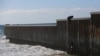 Biden Says He Can’t Stop New Border Barrier Plan 