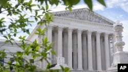 FILE - The Supreme Court building is seen on June 27, 2024, in Washington. The justices will hear a case Tuesday on regulations for ghost guns, privately made weapons that are hard for police to track because they don't have a serial number.