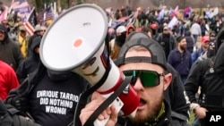 FILE - Ethan Nordean walks toward the U.S. Capitol in Washington in support of President Donald Trump on Jan. 6, 2021. A one-time leader in the Proud Boys, Nordean was sentenced to 18 years in prison for his role in the January 6, 2021, riot at the
Capitol.