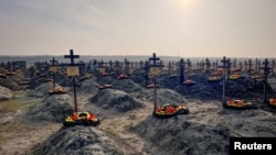 FILE: Makam pejuang kelompok tentara bayaran Wagner Rusia terlihat di dekat desa Bakinskaya, wilayah Krasnodar, Rusia, 22 Januari 2023. (REUTERS/Stringer