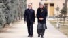 Abdullah Abdullah, left, and Hamid Karzai have remained in Kabul, Afghanistan, since the Taliban seized power.
