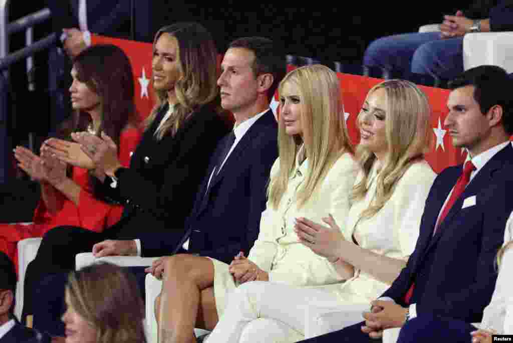 Kimberly Guilfoyle, Lara Trump, Jared Kushner, Ivanka Trump, Michael Boulos, and Tiffany Trump look on as Republican presidential nominee and former U.S. President Donald Trump speaks on Day 4 of the Republican National Convention at the Fiserv Forum in Milwaukee, Wisconsin, July 18, 2024. 