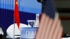 Государственные флаги Китая и США. Совет Безопасности ООН, REUTERS/Thomas Peter/Pool (архивное фото) 