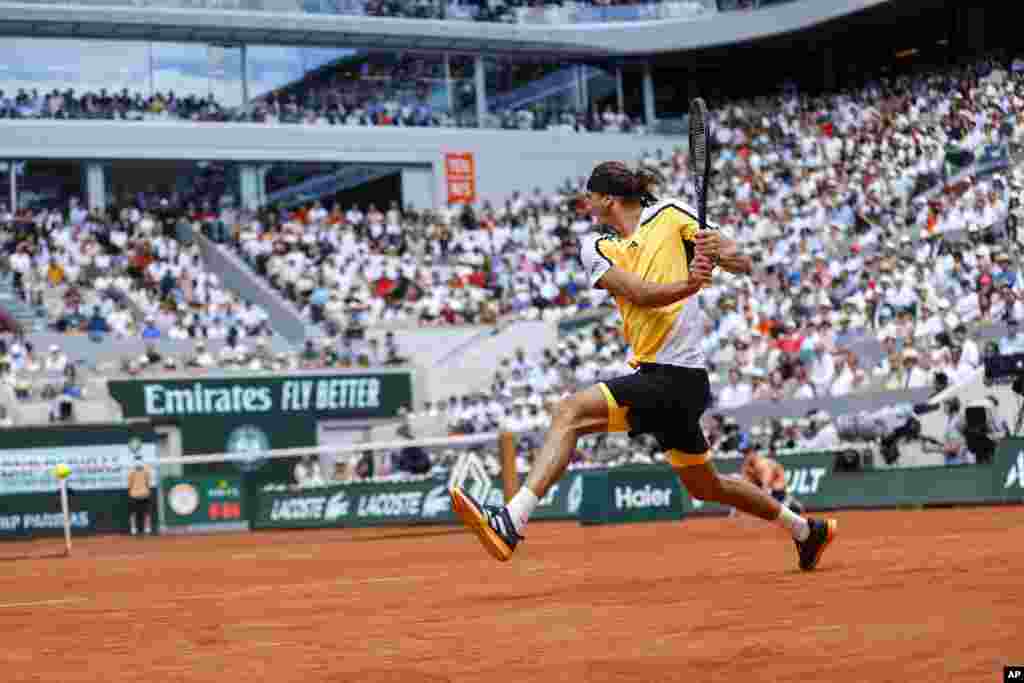 Germany's Alexander Zverev plays a shot against Spain's Carlos Alcaraz during the men's final of the French Open tennis tournament at the Roland Garros stadium in Paris, France.