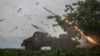 Ukrainian troops retreat, Russian forces advance, as Kyiv awaits weapons infusion