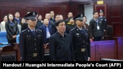 တရုတ်နိုင်ငံဘောလုံးအဖွဲ့ချုပ်ဥက္ကဋ္ဌဟောင်း Chen Xuyuan ကိုတရားရုံးမှာတွေ့ရစဉ် (မတ် ၂၆၊ ၂၀၂၄)