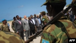 FILE - The head of the United Nations Assistance Mission in Somalia (UNSOM) is welcomed as the mission officially kicks off, at the international airport in Mogadishu, in this photo taken by the African Union-U.N. Information Support Team on June 3, 2013.