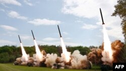 22일 북한 비공개 장소에서 진행된 핵반격가상종합전술훈련 중 방사포가 발사되는 모습. 북한 관영매체 조선중앙통신이 23일 보도.
