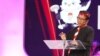 Calon wakil presiden Mahfud MD menyampaikan jawaban yang ditanyakan oleh panelis dalam Debat Kedua Cawapres 2024 yang diadakan oleh Komisi Pemilihan Umum RI (KPU RI) pada Jumat (22/12) di Jakarta. (VOA/Indra Yoga)
