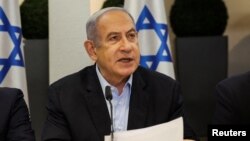FILE - Israeli Prime Minister Benjamin Netanyahu speaks during the weekly cabinet meeting at the Defense Ministry in Tel Aviv, Jan. 7, 2024.