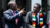 Umongameli Emmerson Mnangagwa (kwesokunene) lomsekeli wakhe uMnu. Constantino Chiwenga (kwesokhohlo)
