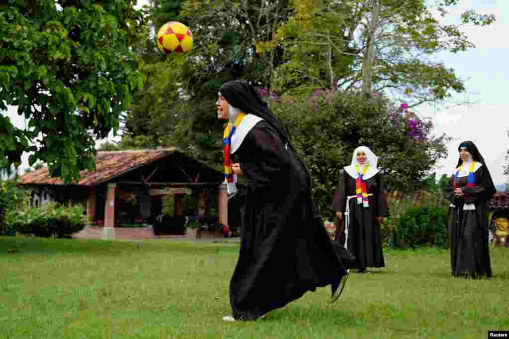 Poor Clare Sisters play soccer as they support the Colombian national team in the Copa America final against Argentina, at a convent in Montenegro, Colombia, July 13, 2024.