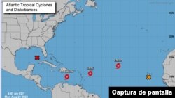 Sistemas de tormentas tropicales en Atlántico, el Caribe y el Golfo de México el 21 de agosto de 2023. Captura de pantalla del sitio del Centro Nacional de Huracanes de EEUU.