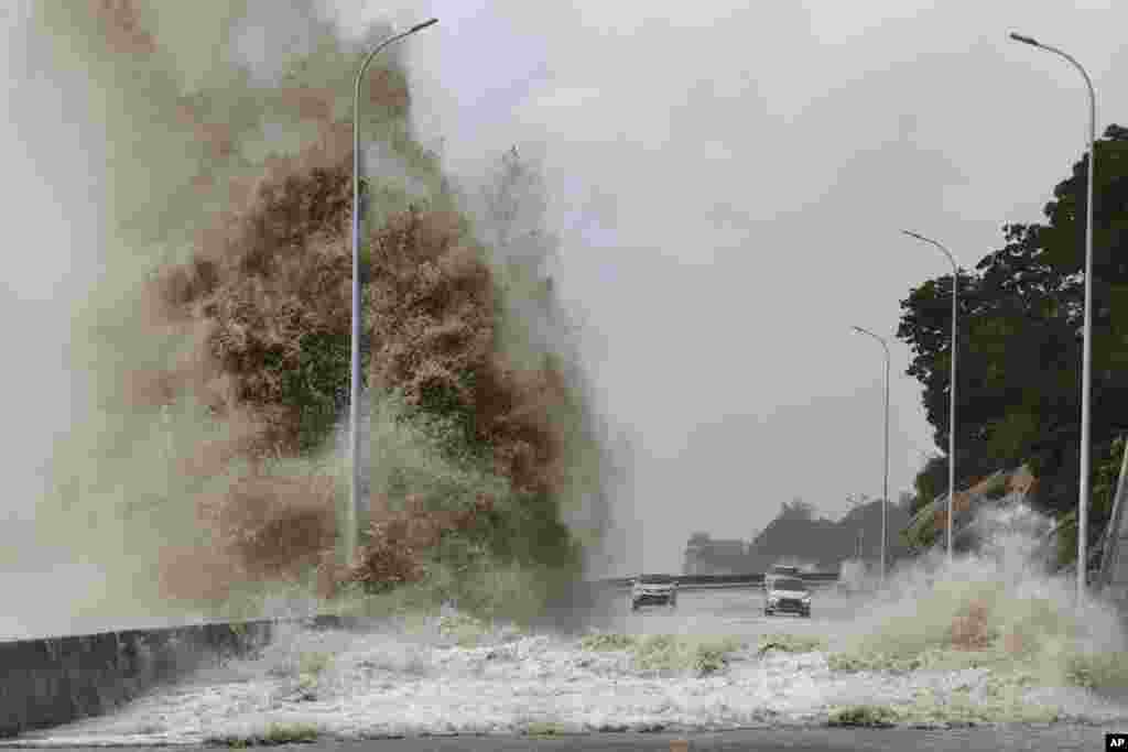 In this photo released by Xinhua News Agency, huge waves lash the shore ahead of landfall by Typhoon Gaemi in Sansha Township of Xiapu County, southeast China's Fujian Province, July 25, 2024.