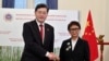 Menlu RI Retno Marsudi (kanan), berjabat tangan dengan Menlu China Qin Gang dalam pertemuan di Jakarta, Rabu, 22 Februari 2023. (Adek Berry/Pool Photo via AP)