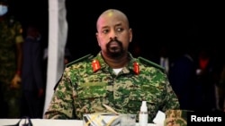 ፋይል፡ የዩጋንዳው ፕሬዝዳንት ዩዌሪ ሙሴቬኒ ልጅ ሙሁኦዚ ካይኔሩጋባ 