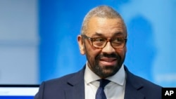 FILE - British Foreign Secretary James Cleverly attends a meeting with teams coordinating the evacuation of British nationals from Sudan, at the FCDO Crisis Centre, in London, April 25, 2023.