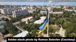 FILE - Ukrainian flag in Mykolaiv. (Adobe stock photo by Roman Soloviev)