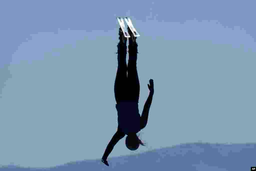 An aerials skiing athlete jumps at the Eccles Olympic Freestyle Pool in Park City, Utah.