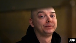 FILE - Russian journalist Ivan Safronov, who was arrested in July 2020 on treason charges, appears in court in Moscow on April 4, 2022. Russia's Supreme Court rejected an appeal of his 22-year prison sentence on Aug. 2, 2023.