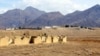 FILE - The Mes Aynak valley, southwest of Kabul, Afghanistan, is pictured March 2, 2022. The unexploited copper source is estimated to be worth nearly $1 trillion. China's MCC won the contract to exploit the mine over 10 years ago.