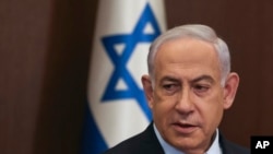 FILE - Israeli Prime Minister Benjamin Netanyahu attends the weekly cabinet meeting at the Prime Minister's office in Jerusalem, Dec. 10, 2023.