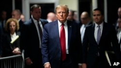 FILE - Former President Donald Trump leaves Manhattan criminal court, Feb. 15, 2024, in New York. 